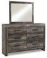 Wynnlow Queen Crossbuck Panel Bed with Mirrored Dresser, Chest and Nightstand